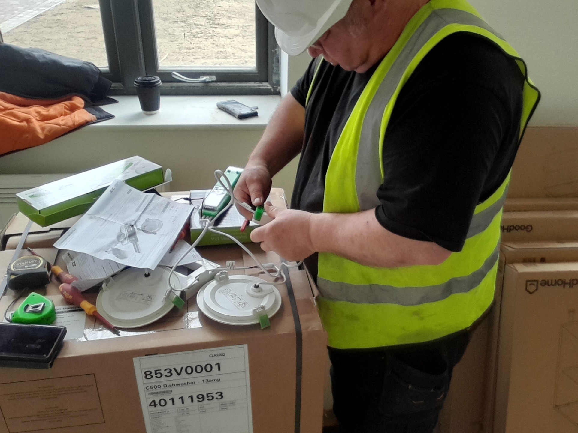 Gilly working on downlight installation